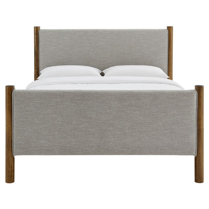 Oatmeal fabric upholstered platform bed with natural wood posts, clean modern frame and white bedding