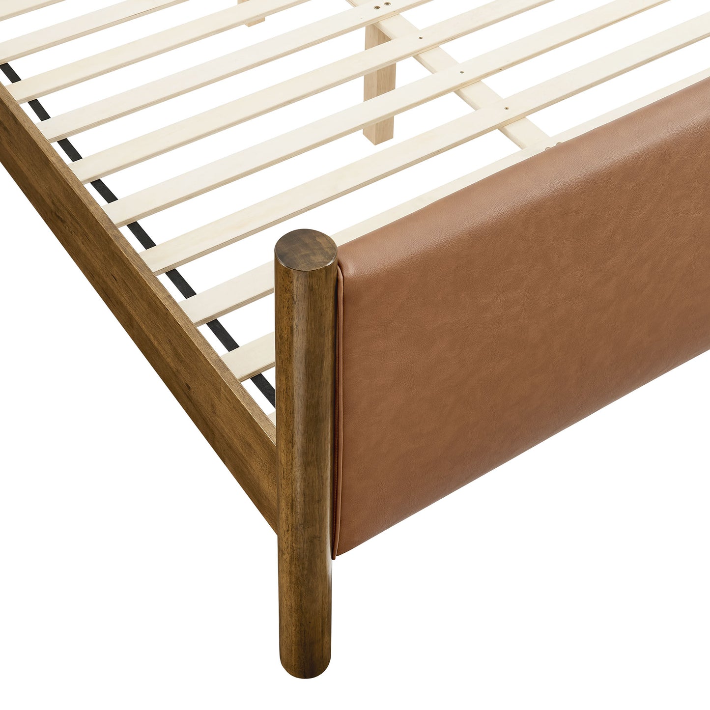 Walnut bed frame with tan vegan leather upholstered footboard panel and wooden slat base.