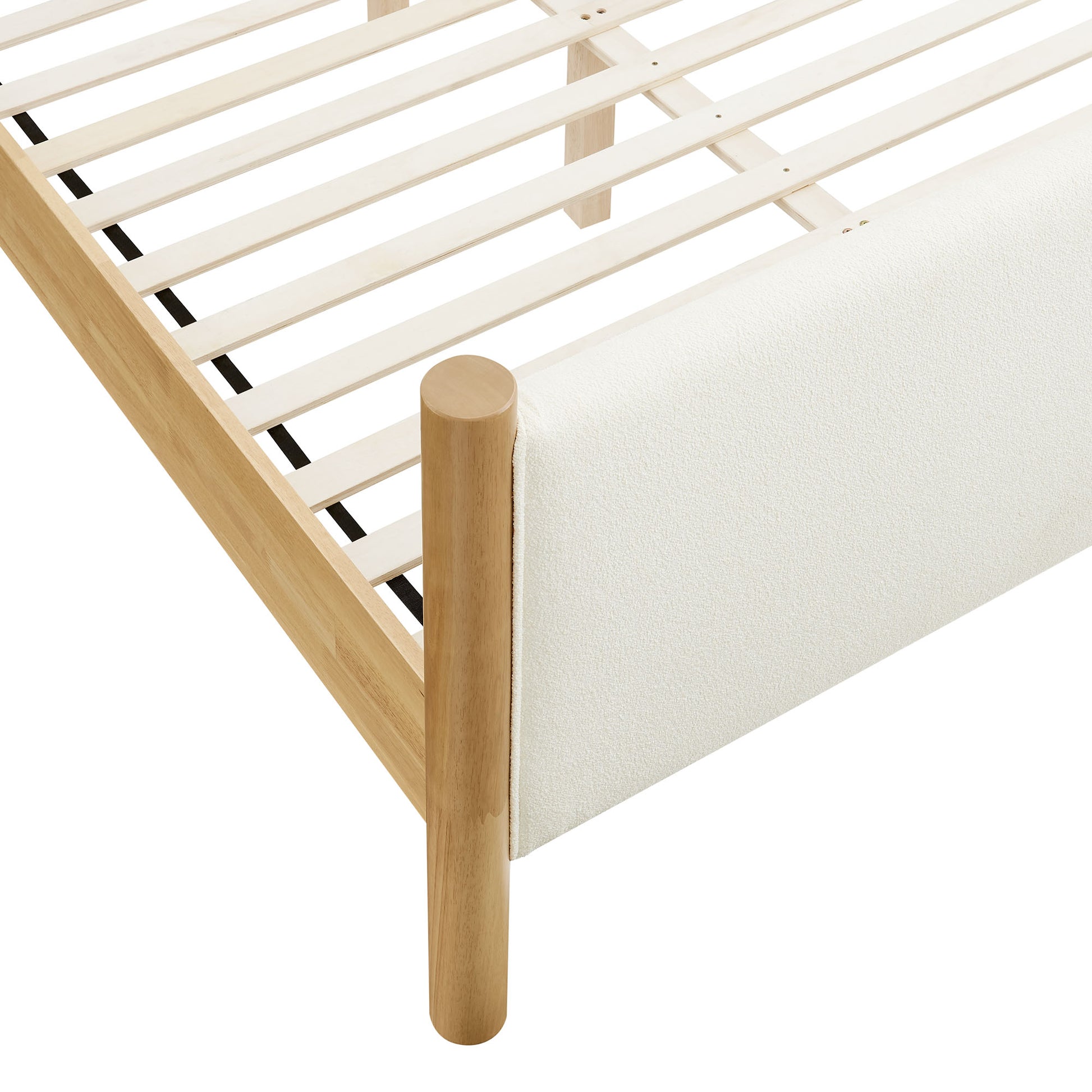 Ivory bouclé upholstered platform bed (queen size) with a slatted base.