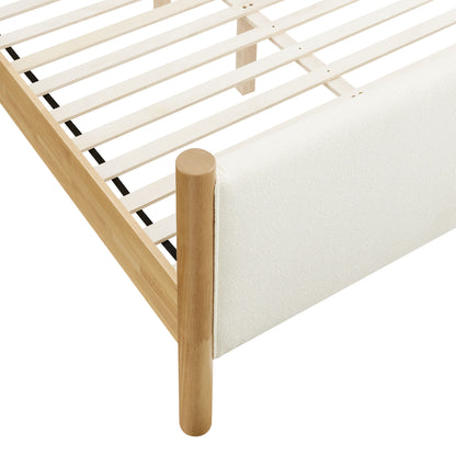 Ivory bouclé upholstered platform bed (queen size) with a slatted base.