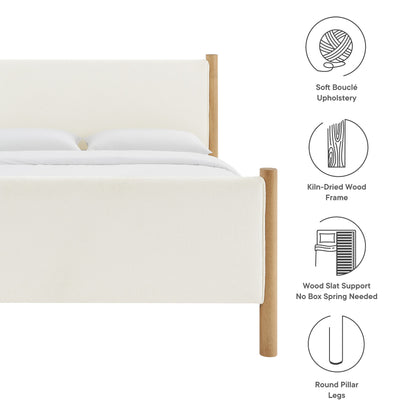 Cream boucle upholstered platform bed with kiln-dried oak frame and round pillar legs; slat support, no box spring needed.