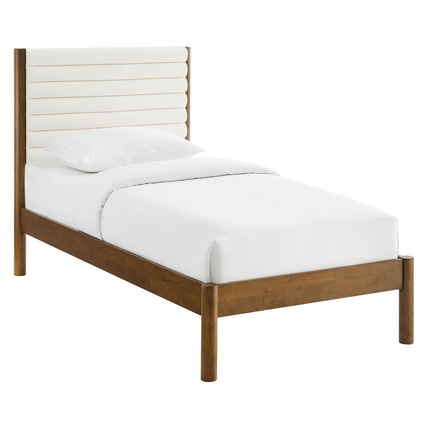Walnut wooden bed frame with padded cream headboard and white bedding; mid-century modern twin bed.