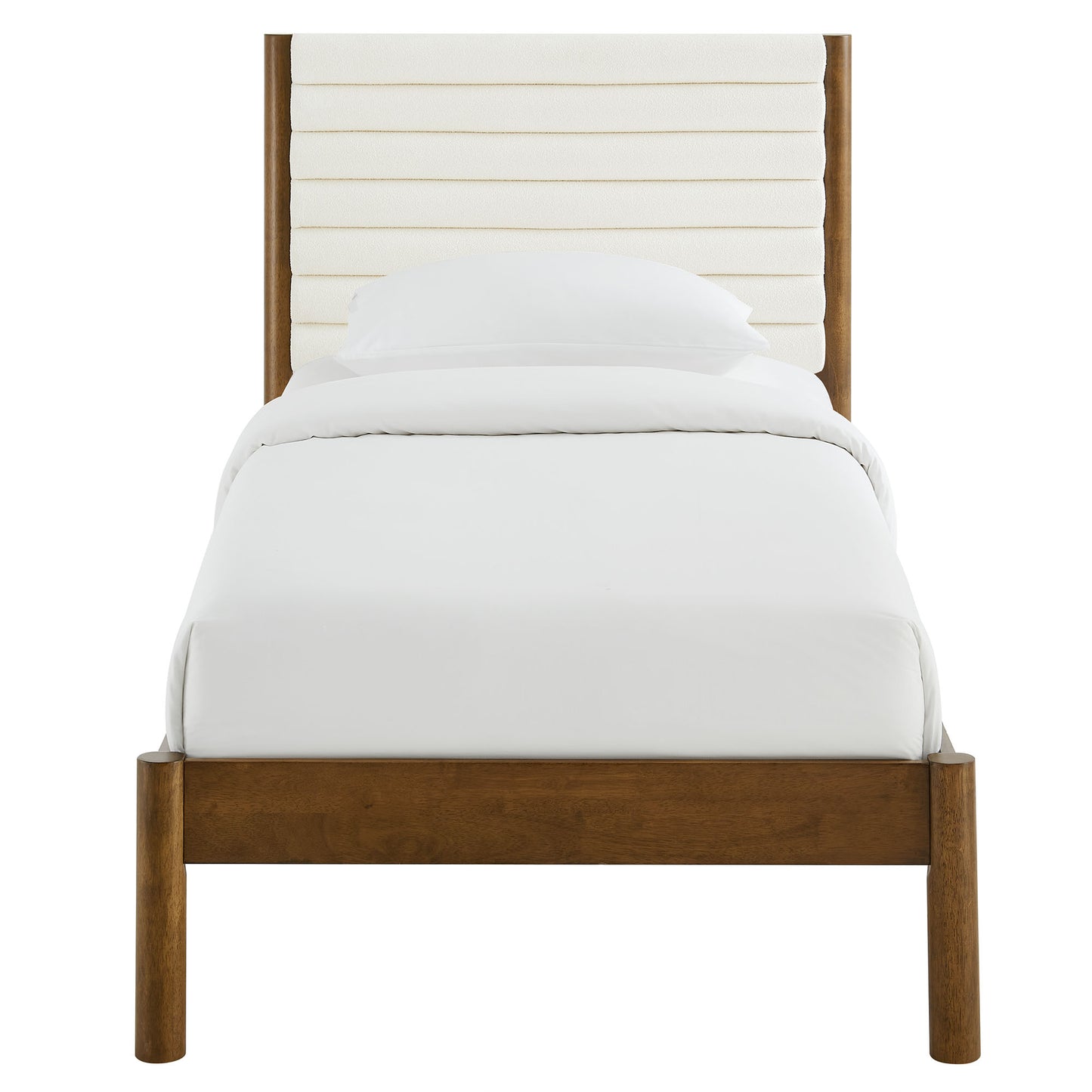 Walnut solid wood twin platform bed with a channel-tufted boucle upholstered headboard and white linens.