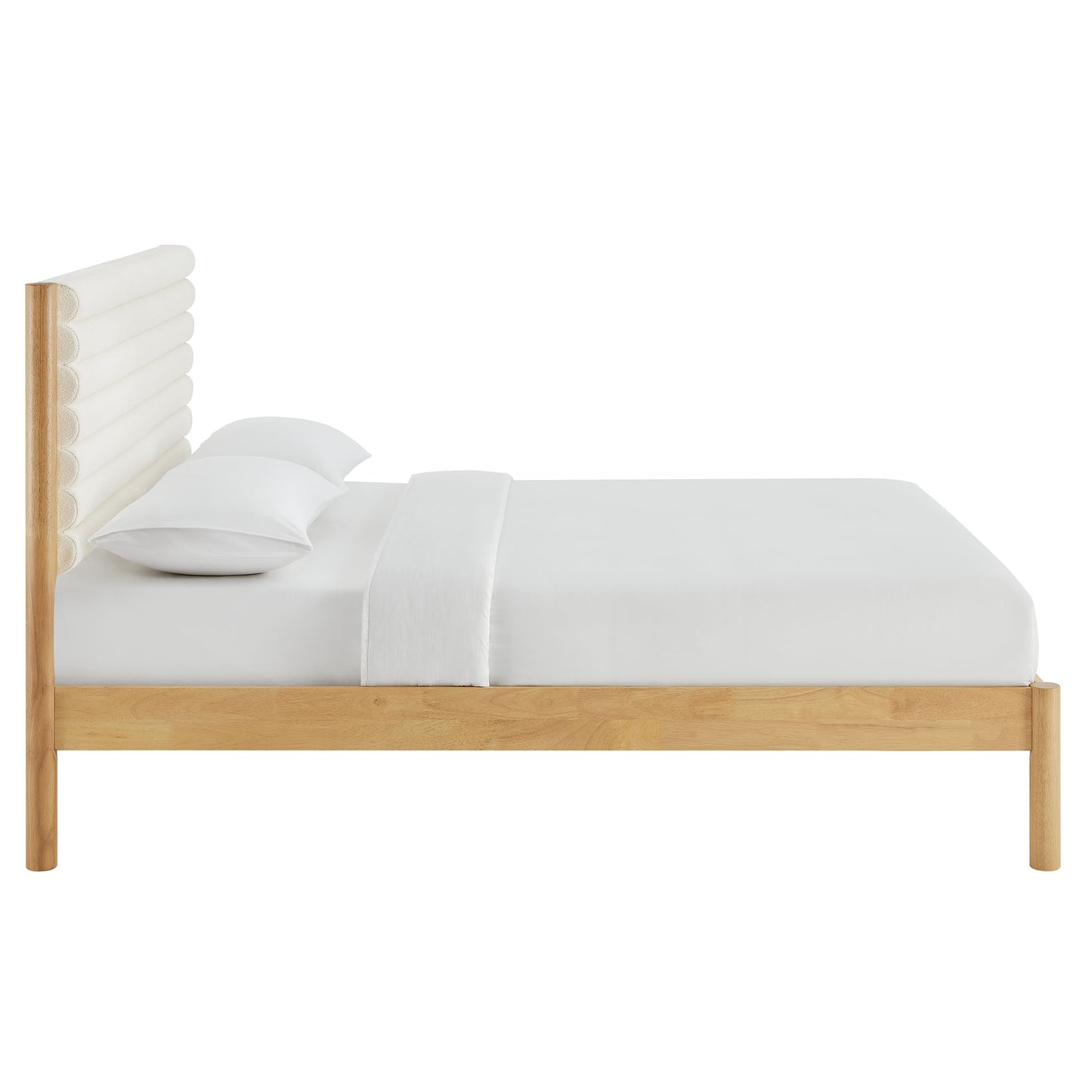 Brown solid wood king platform bed with a tall channel-tufted boucle headboard and crisp white linens in a minimalist style.