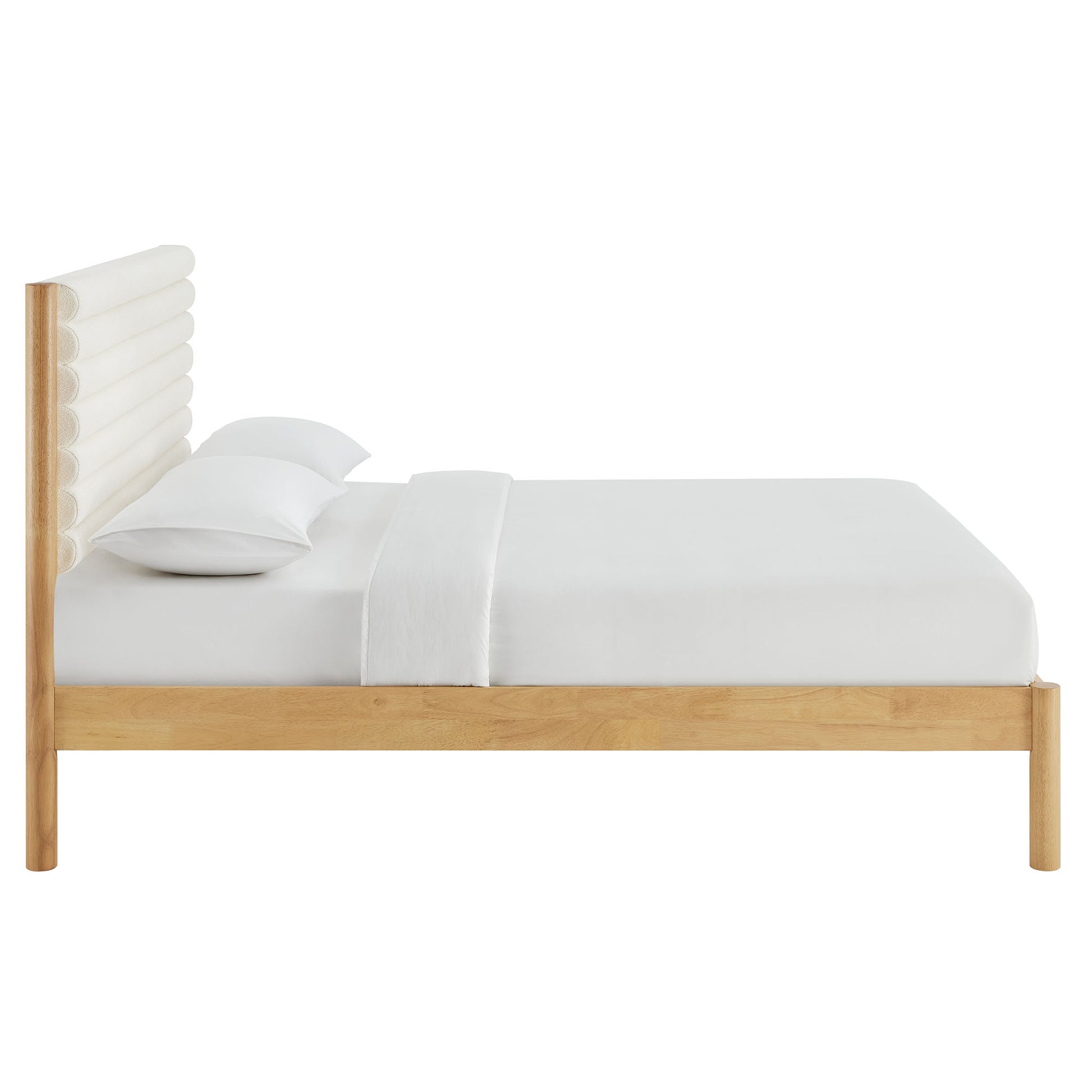 Brown solid wood king platform bed with a tall channel-tufted boucle headboard and crisp white linens in a minimalist style.