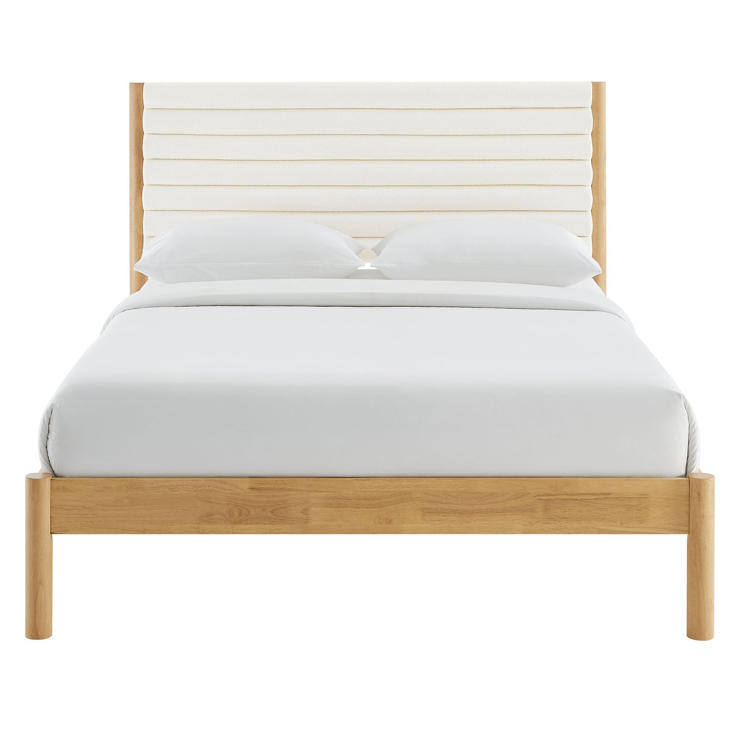 Oak-finish platform bed with padded cream headboard and white bedding.