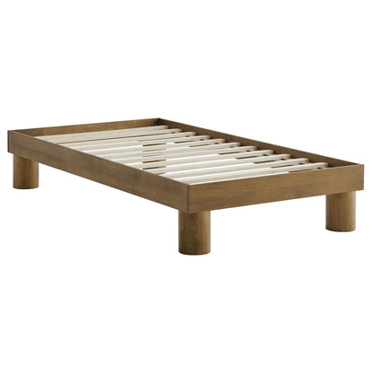 Brown wooden platform bed frame with white slats, low-profile design and four rounded legs.