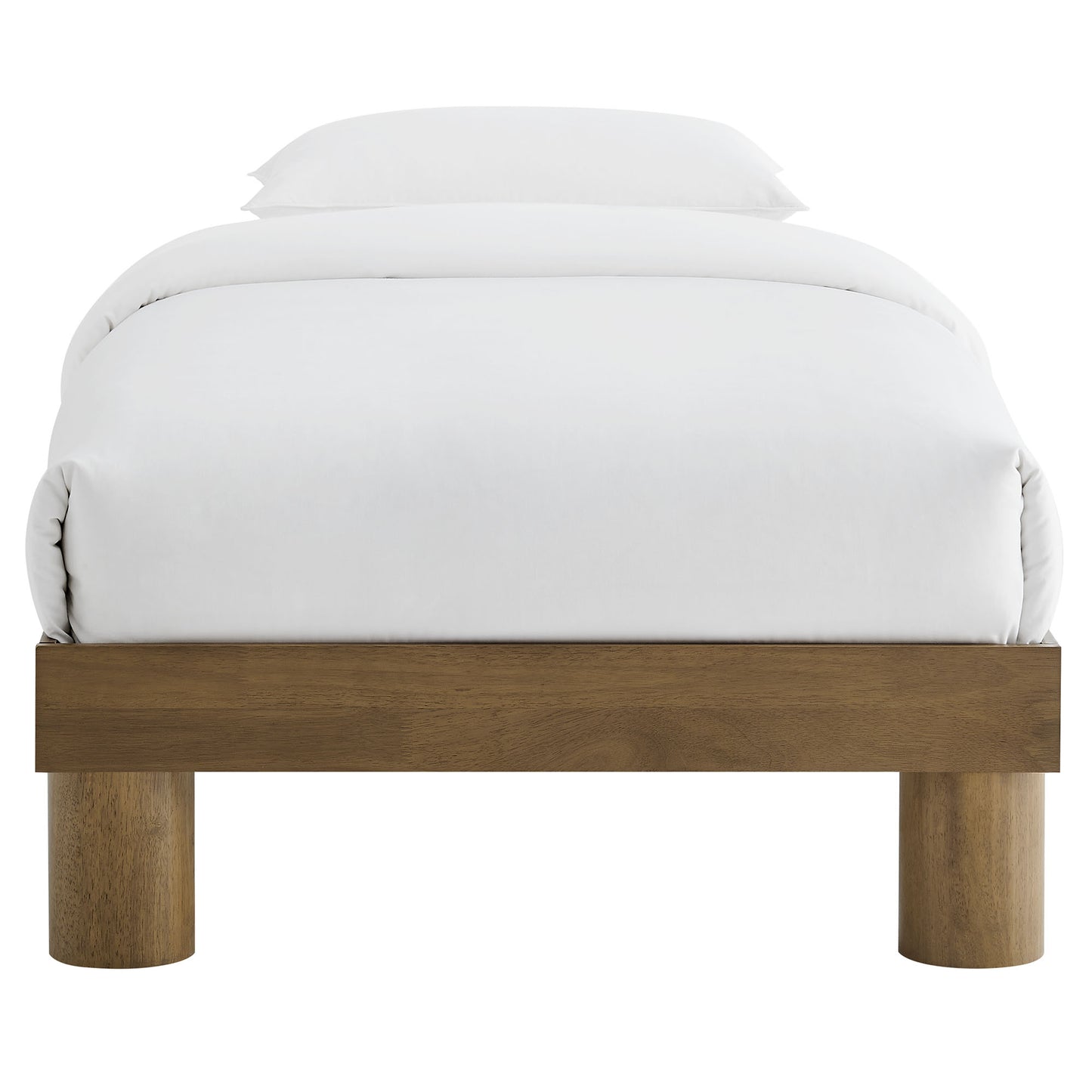 Solid wood platform bed with white duvet and pillows; rectangular frame, chunky cylindrical legs, mid-century modern style.