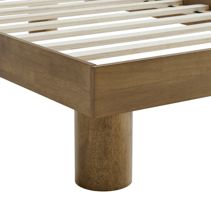 Brown wooden platform bed frame with slatted top and a rounded cylindrical leg, mid-century modern style.