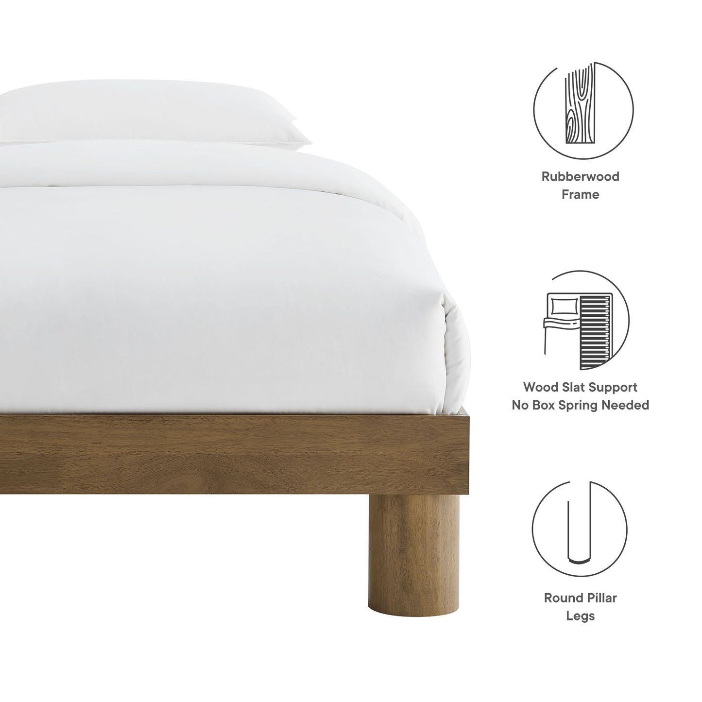 White bedding on a warm brown wood platform bed with round pillar legs and wood slat support (no box spring needed)