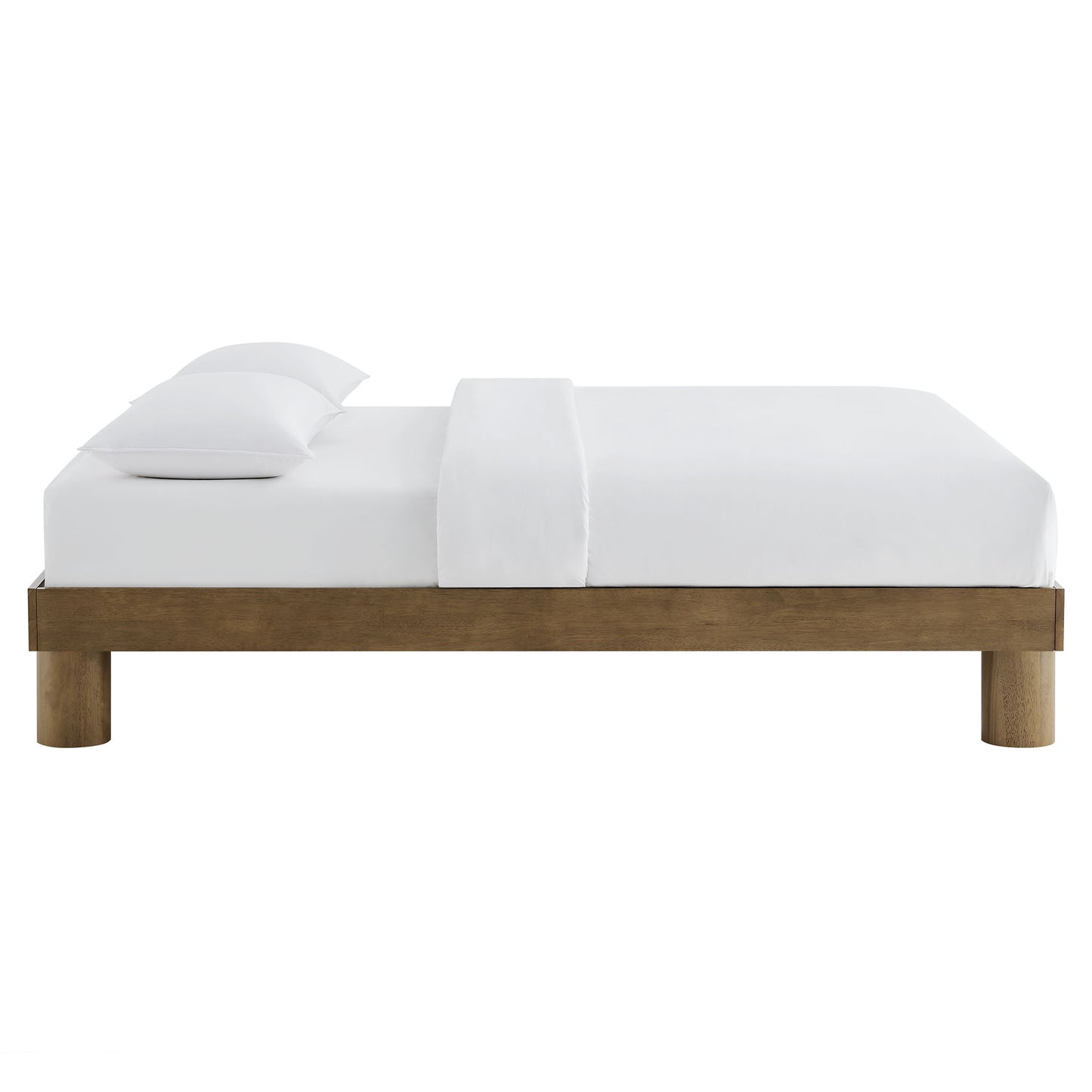 Brown wood platform bed with rounded legs and white bedding for a minimalist low-profile look