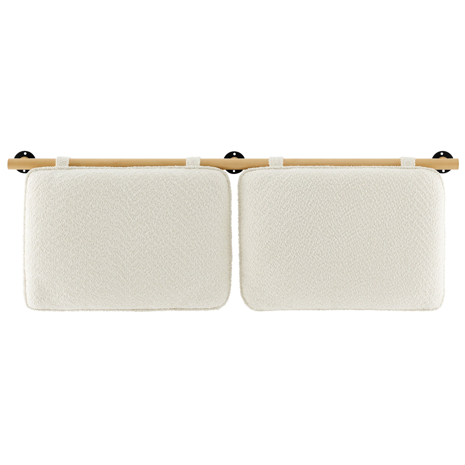 Pair of cream textured cushions mounted on a light wood rod with white loops and black wall brackets.