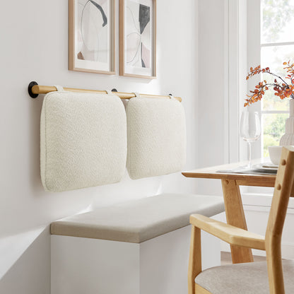 Cream chenille upholstered wall-mounted queen headboard in a bedroom, featuring a soft textured finish.