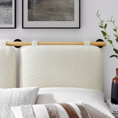 Cream chenille upholstered queen headboard, wall-mounted; neutral bedding in a modern bedroom.