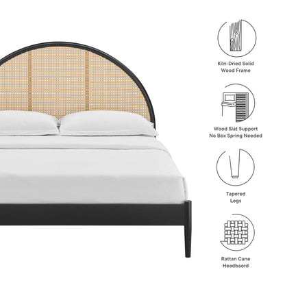 Odette bed with black kiln-dried solid wood frame, arched rattan cane headboard, tapered legs, slat support.