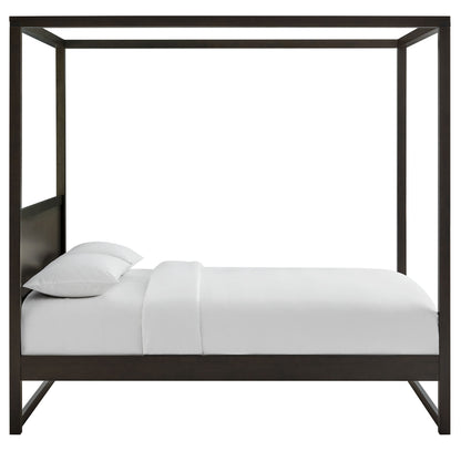 Dark wood king canopy bed frame with white linens and two pillows, modern minimalist design.