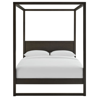 Dark wood four-poster bed with white bedding and pillows; minimalist canopy frame.
