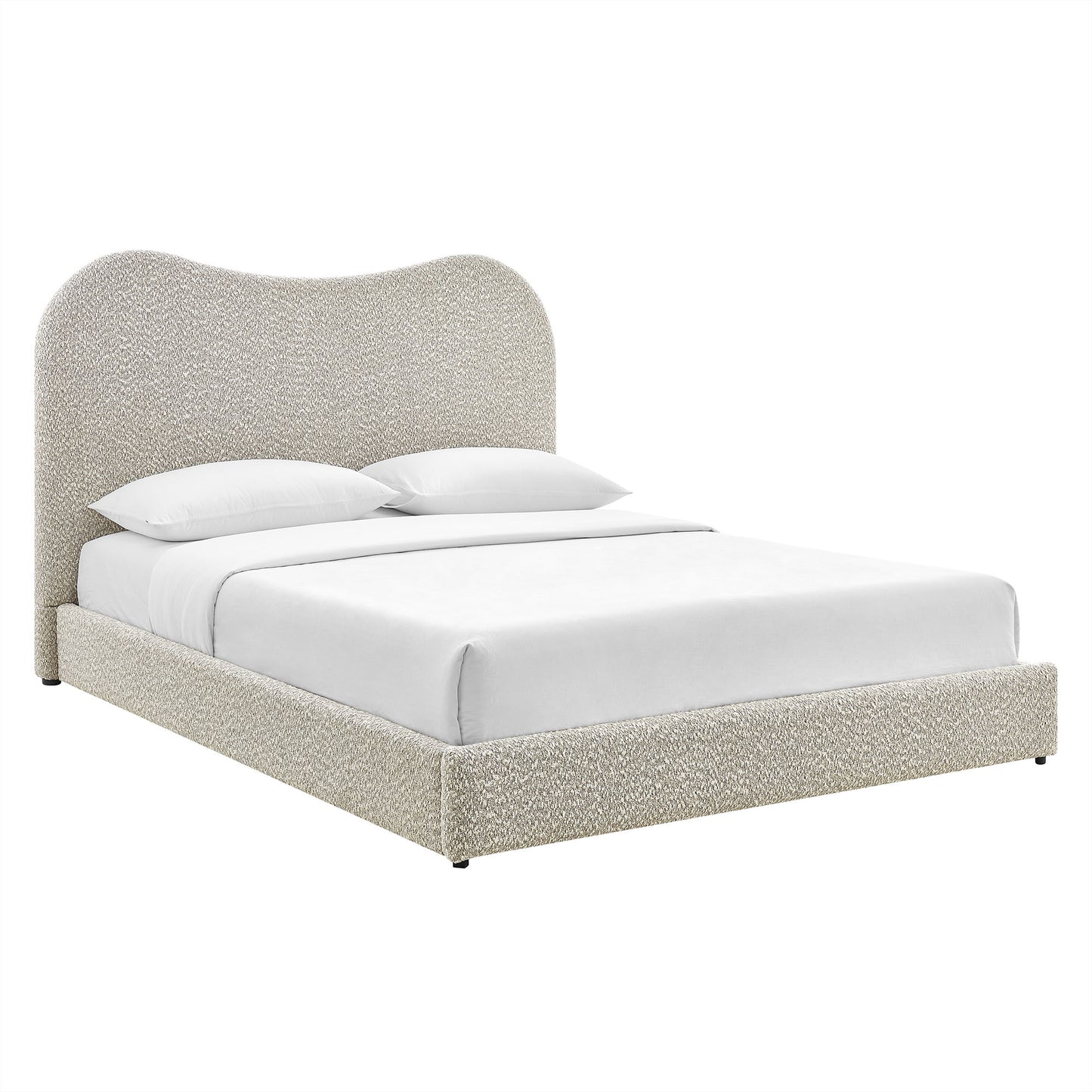 Cream boucle upholstered platform bed with a tall curved headboard and white sheets and pillows.