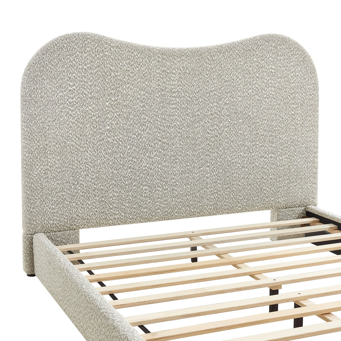 Beige boucle upholstered bed frame with curved headboard & wooden slat base.
