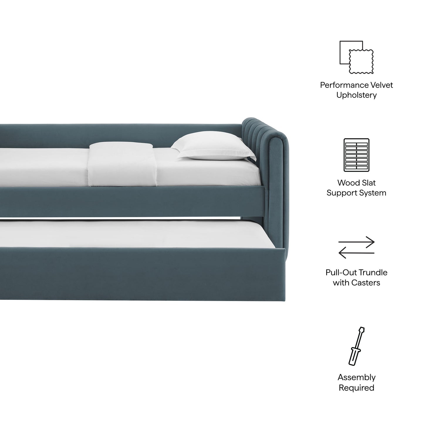 Cadet blue velvet twin daybed with channel-tufted headboard and trundle; low-profile frame; pull-out trundle on casters with wood slat support.