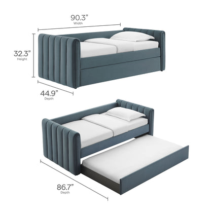 Blue velvet upholstered twin daybed with vertical channel-tufted headboard and footboard; pull-out trundle; 90.3" wide.