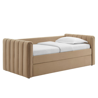 Taupe upholstered twin daybed with tall vertical channel-tufted sides & a solid base, white bedding, includes a trundle.