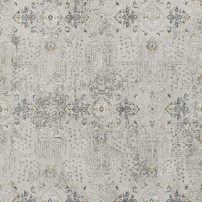 Grey distressed oriental area rug with geometric motifs in blue, ivory and yellow accents; woven rug for living room decor.