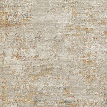 Rectangular beige area rug with a muted distressed floral pattern in tan, gold & blue-grey; textured woven surface.