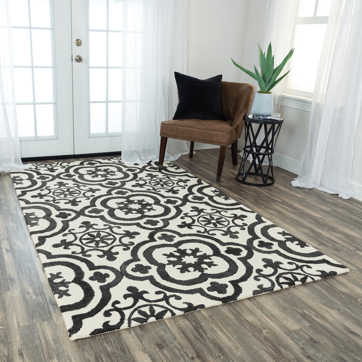 Geometric rug with a matrix-style pattern in a transitional design, 9' x 12'.