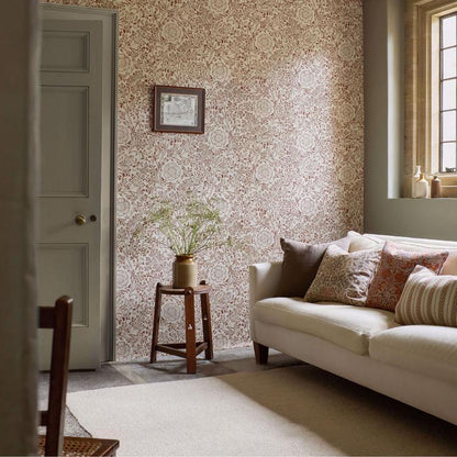 William Morris Chamomile Wallpaper in Flax/Madder by Morris & Co showcasing an elegant all-over pattern of delicate chamomile flowers, graceful stems, and fine botanical linework in warm neutral and earthy red tones. Ideal for traditional, cottage, and Arts & Crafts interiors.