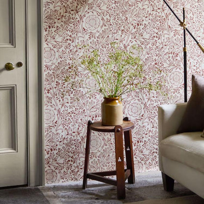Morris & Co Chamomile Wallpaper in Flax/Madder with detailed chamomile blossoms, flowing foliage, and embroidery-inspired artwork. A classic William Morris botanical wallpaper that adds warmth and heritage style to elegant home interiors and statement walls.
