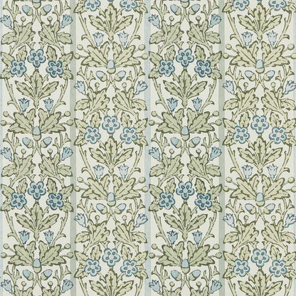 Oak & Blossom Wallpaper by Morris & Co. in Thyme and Woad featuring a botanical pattern of blossoms, oak leaves, acorns, and double stripe detailing. This elegant heritage wallpaper has a soft block-printed texture and stained-glass-inspired design, creating a timeless Arts & Crafts look for luxury bedrooms, living rooms, dining spaces, and feature walls.