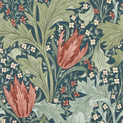 Floral wallpaper pattern with large green leaves, pink lily blooms, and small white flowers on indigo background.