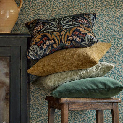 William Morris Sunflower Caffoy Velvet Fabric in Sussex Rush featuring rich golden sunflower floral motifs with flowing vine patterns on a luxurious velvet surface. This Morris & Co upholstery fabric is inspired by the 1879 Sunflower wallpaper design and is ideal for high-end drapery, cushions, headboards, roman shades, and luxury interior design projects requiring durable, decorative velvet.