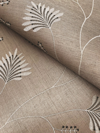 Astoria Laelynn wallpaper MX9607 in Taupe — embroidered botanical columns in metallic silver and charcoal threads over a sisal grasscloth base, giving depth and texture to a neutral taupe ground, ideal for luxury and nature‑inspired interiors.