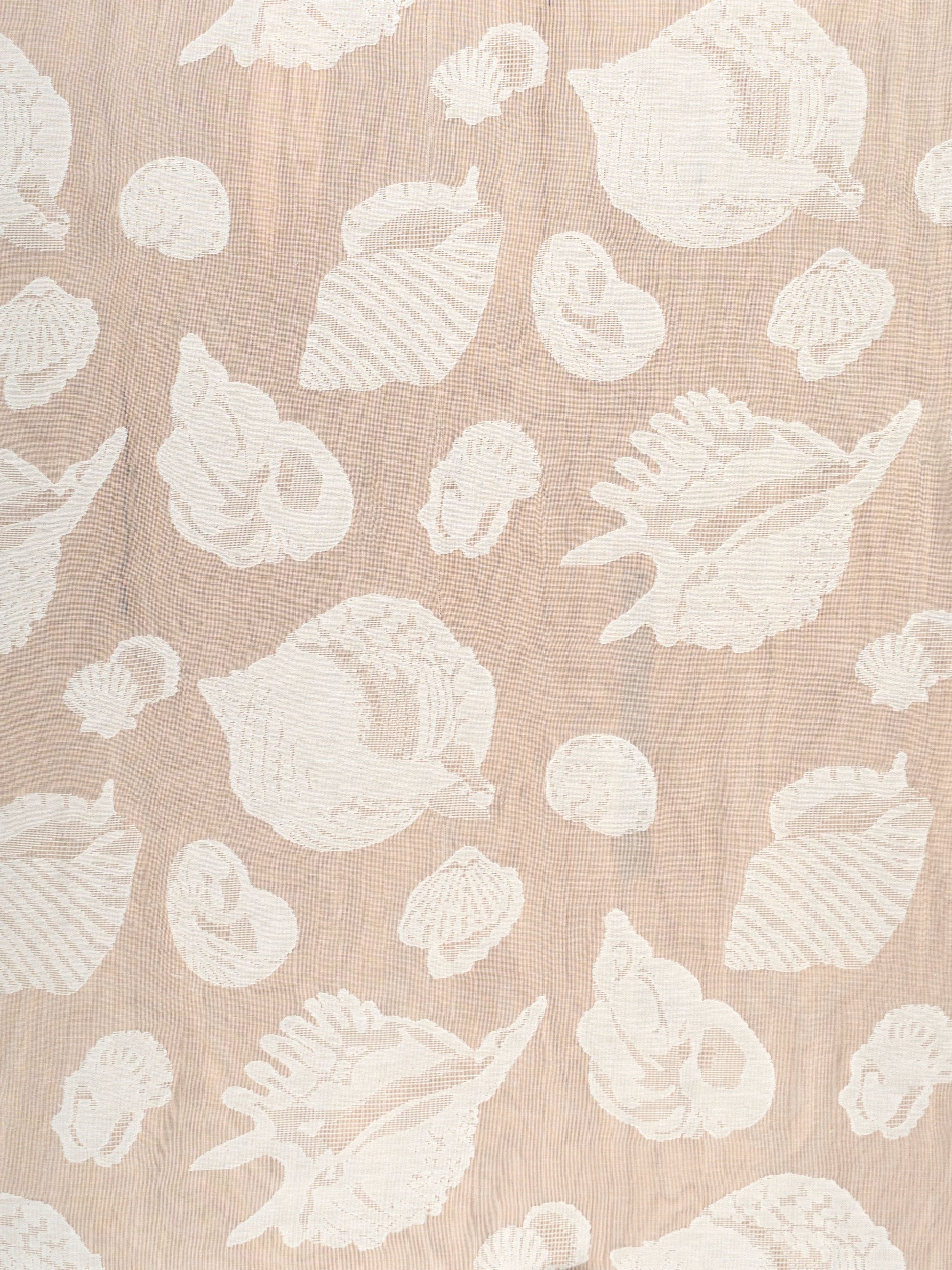 Cream seashell silhouettes on natural sheer fabric with a coastal pattern.