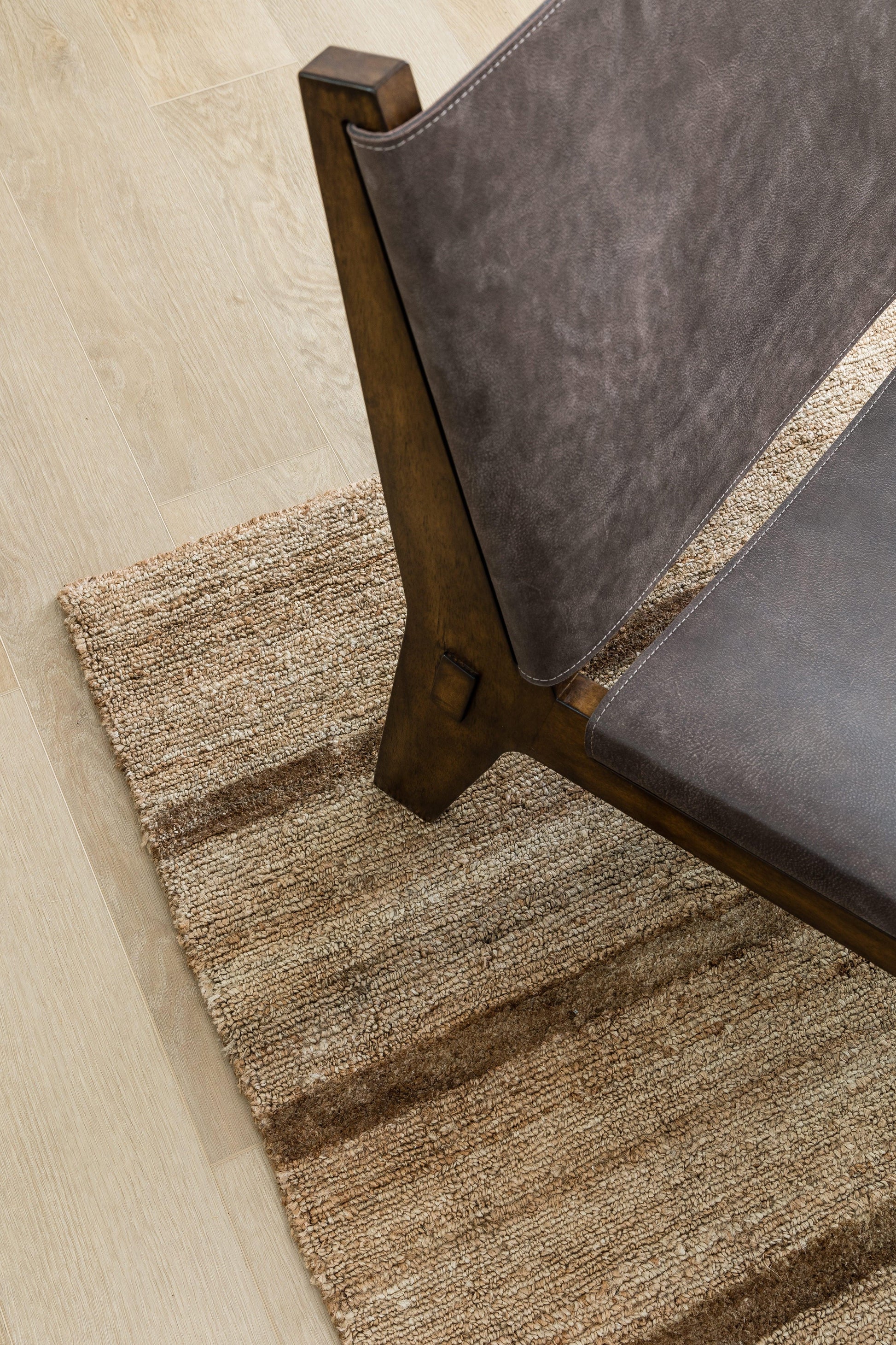 Beige textured striped rug.