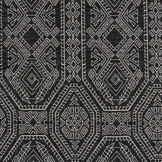 Black and white Navajo-inspired geometric pattern with diamonds and hex motifs on a woven Jacquard fabric.