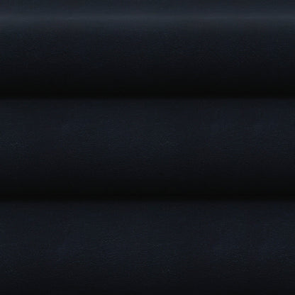 Dark navy faux leather fabric folded into horizontal layers, flat-lay presentation with smooth grain.