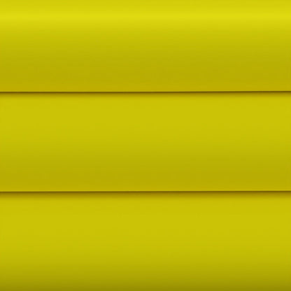 Flatlay of bright yellow layered fabric swatches with smooth texture in a modern minimalist style.