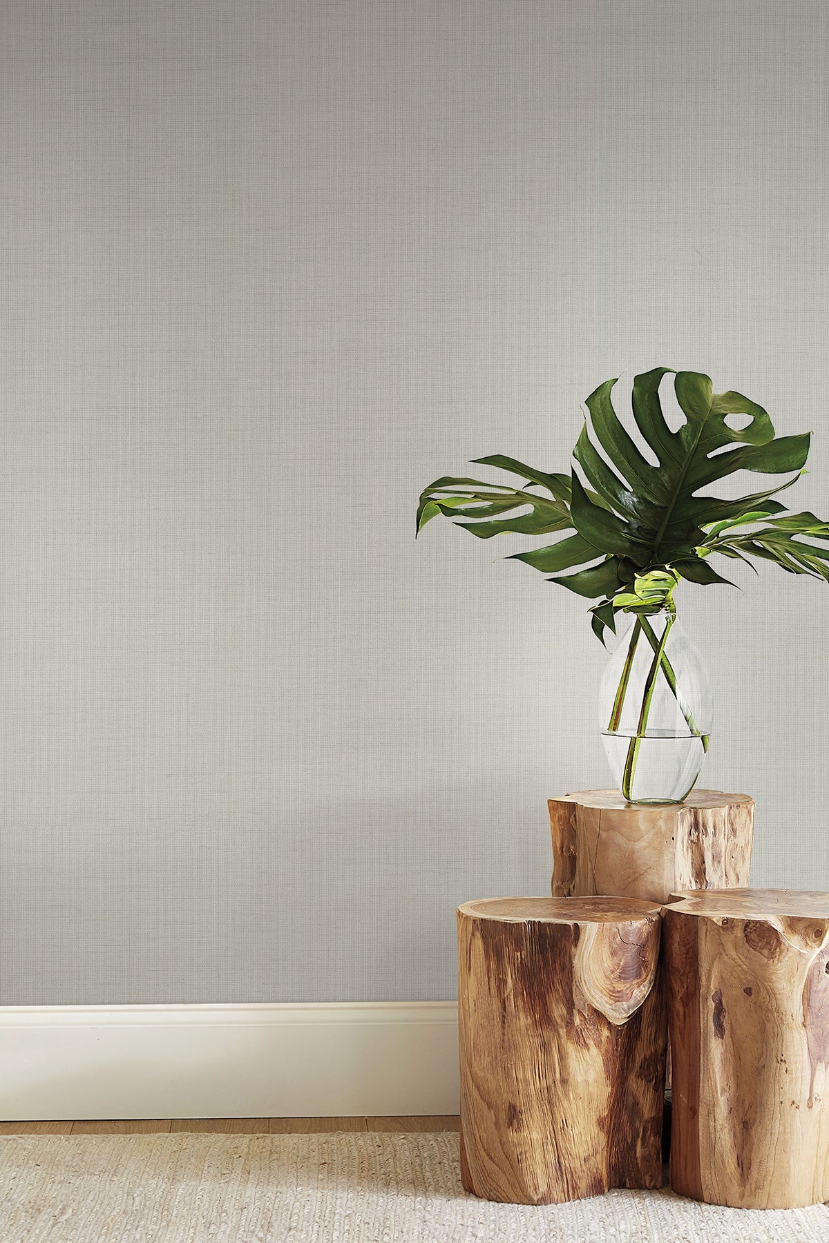 Grey wallpaper texture with black accents.