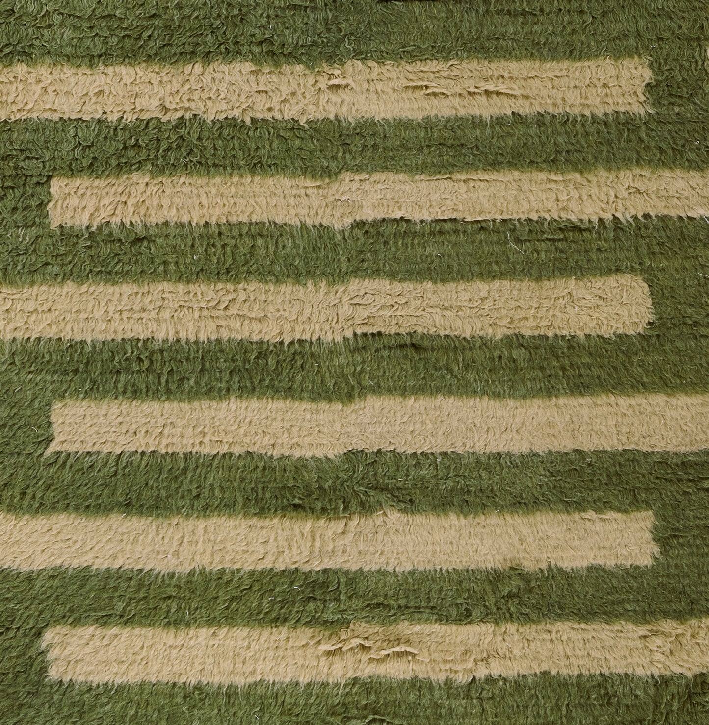 Olive-green and tan striped shag rug with plush, textured bands for a cozy, modern look.