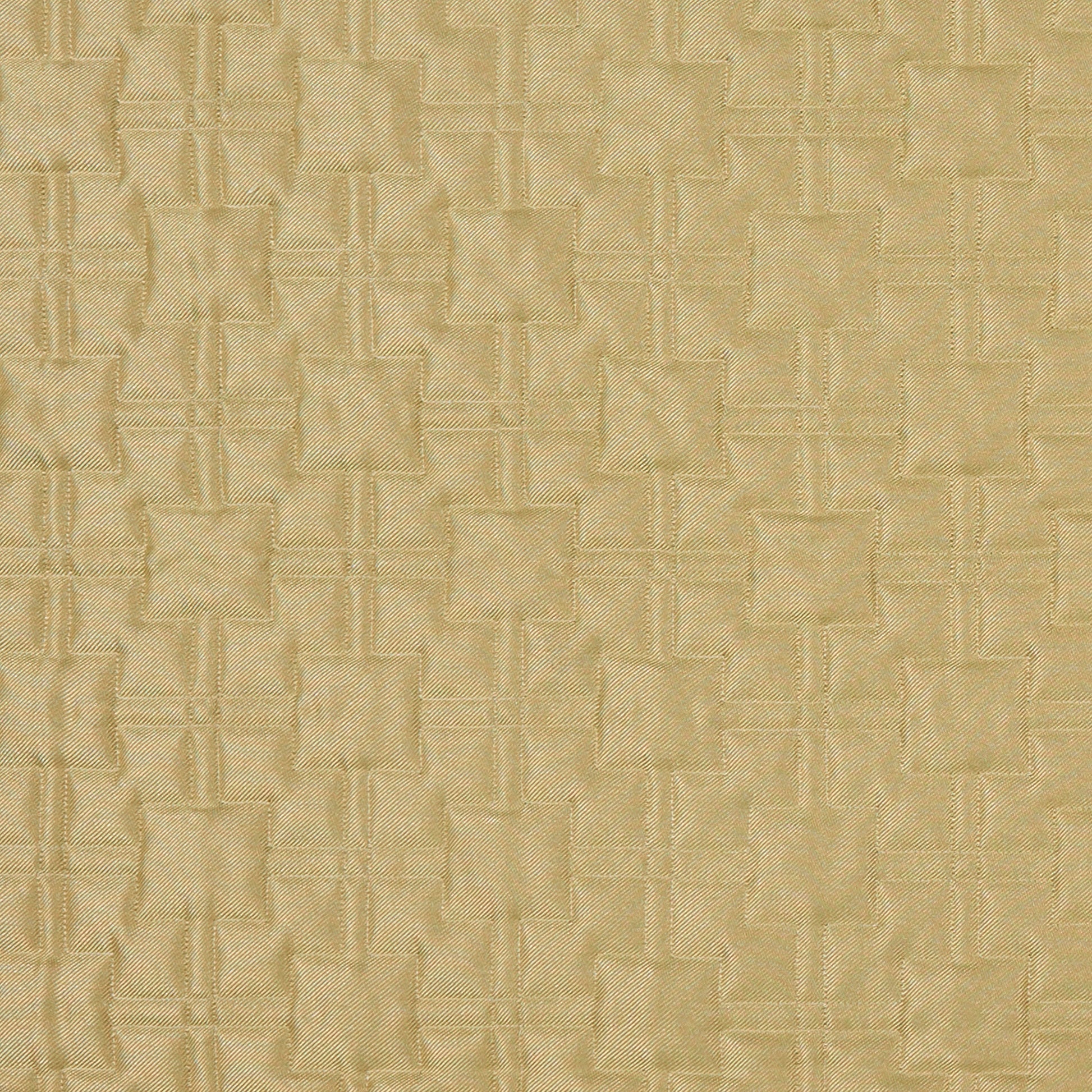 Green jacquard fabric with a geometric embossed pattern and luxe upholstery texture.