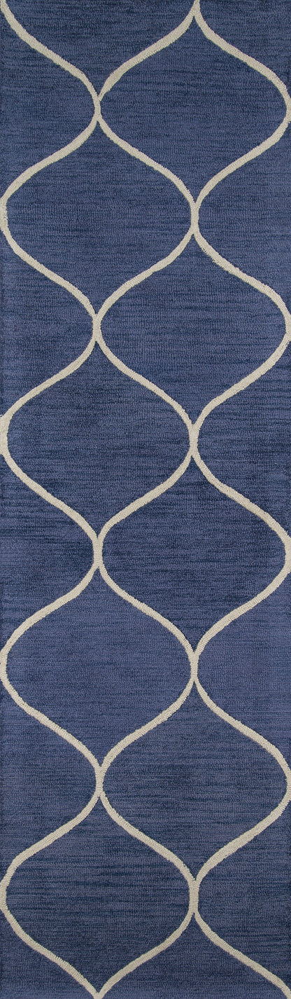 Navy blue area rug with a cream curved lattice trellis design.