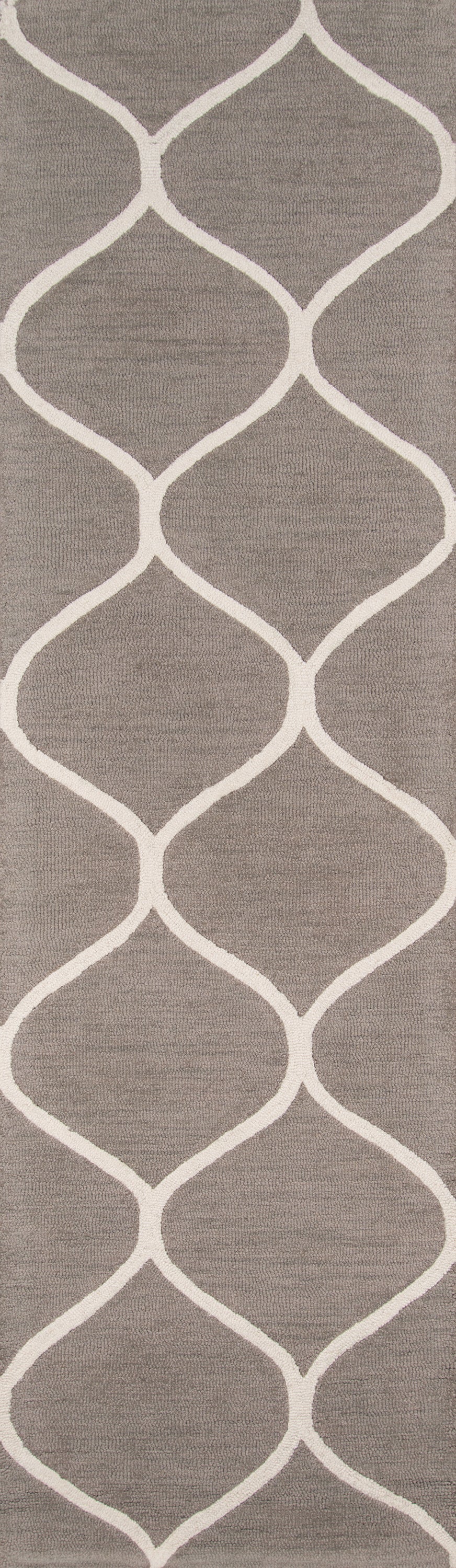Taupe-grey area rug with white interlocking curved lattice pattern; modern geometric design.