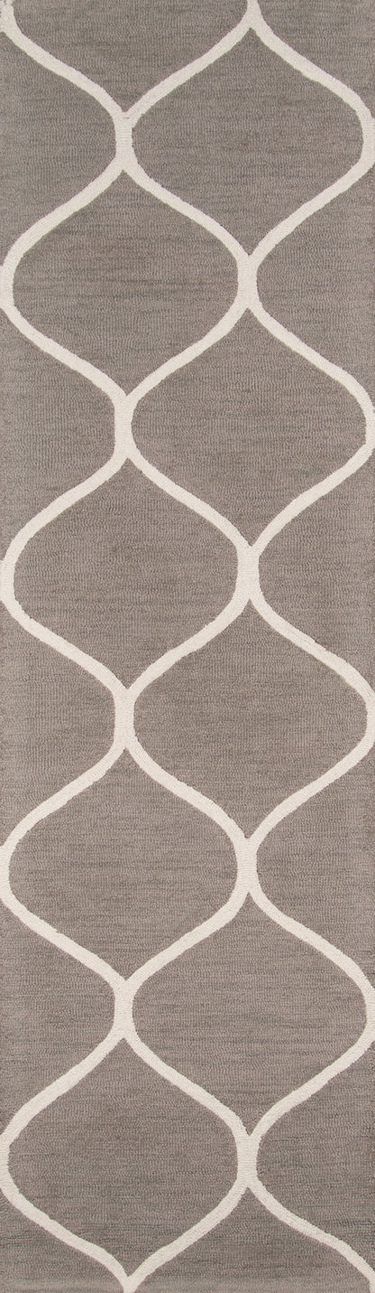 Taupe-grey area rug with white interlocking curved lattice pattern; modern geometric design.