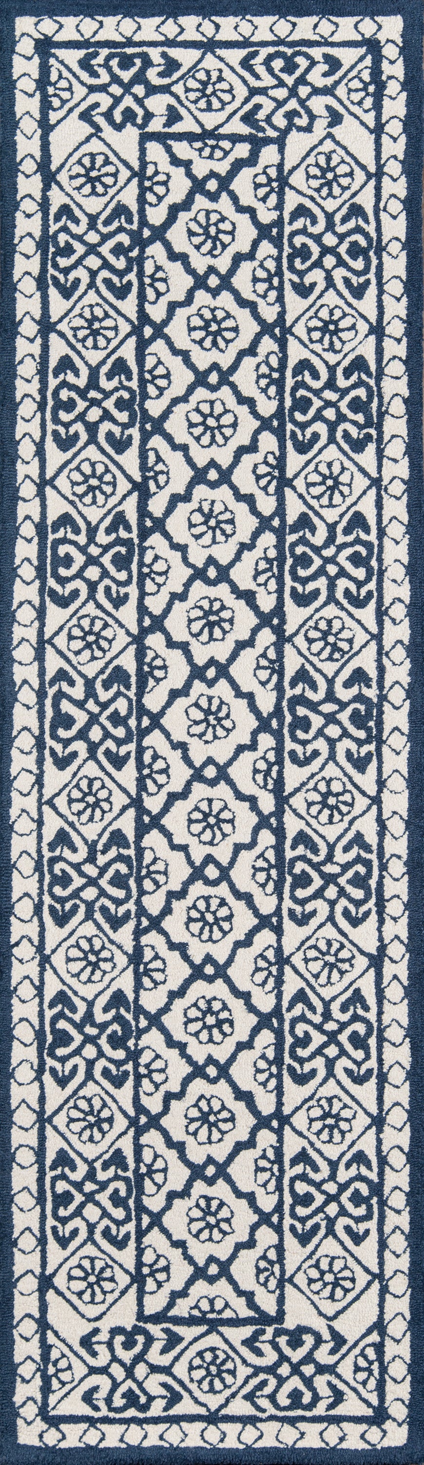 Navy and ivory ornate runner rug with repeating floral and diamond motifs, long rectangular hallway decor.