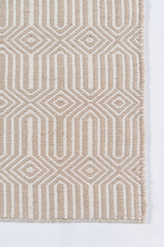 Beige and ivory geometric rug with diamond motifs and vertical lines, textured looped pile, fringed edge.