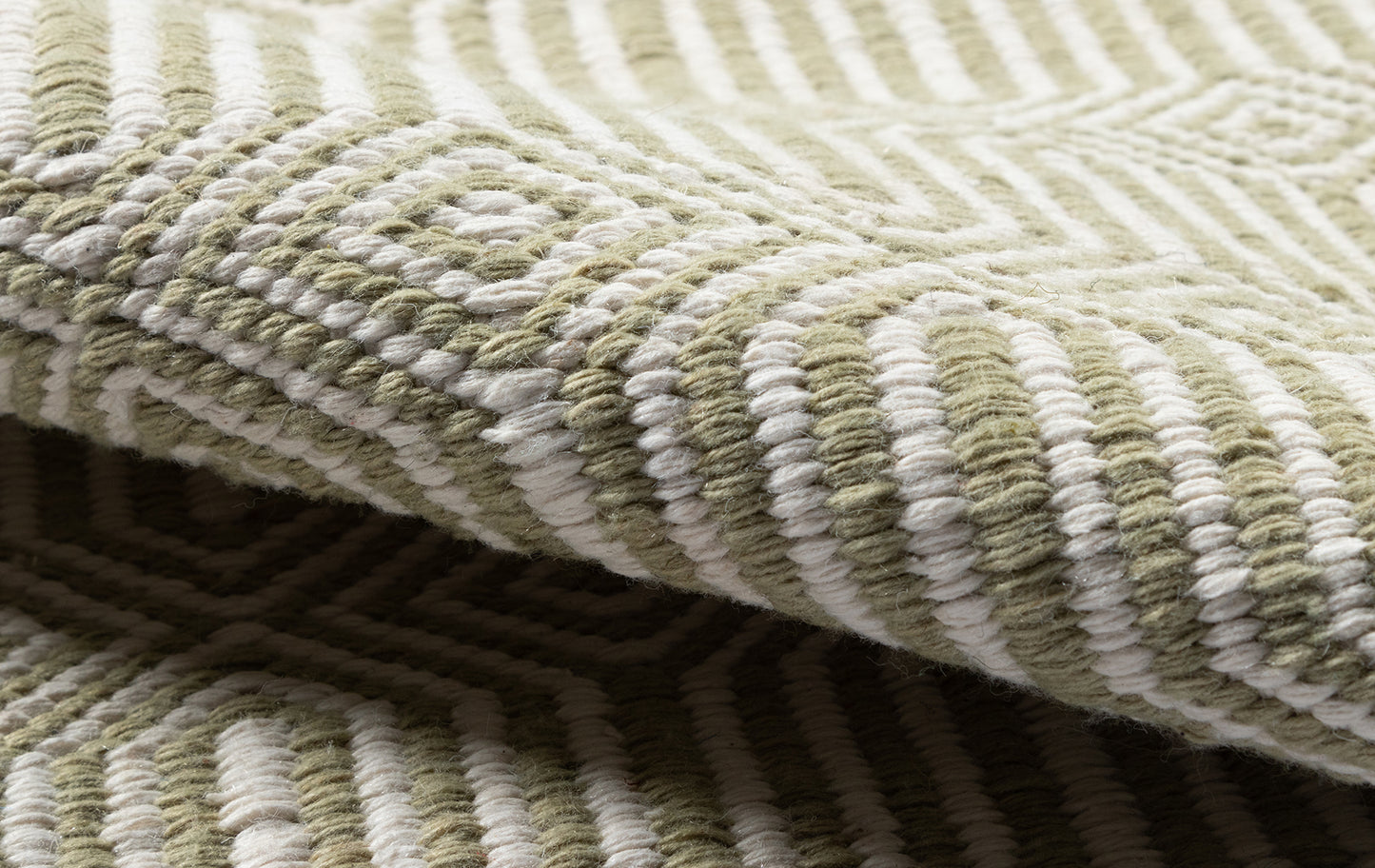 Olive and cream striped wool rug with chunky looped pile; soft, textured, cozy coastal living room rug.