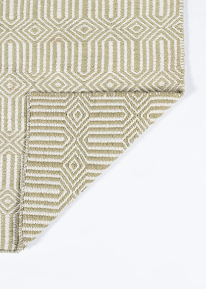 Beige & cream geometric woven rug with interlocking diamond pattern; folded corner reveals tight, textured weave.